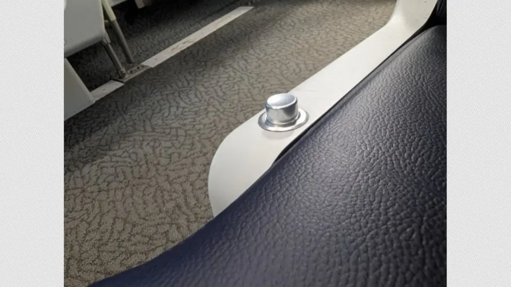 small lever or button to recline amtrak Seats